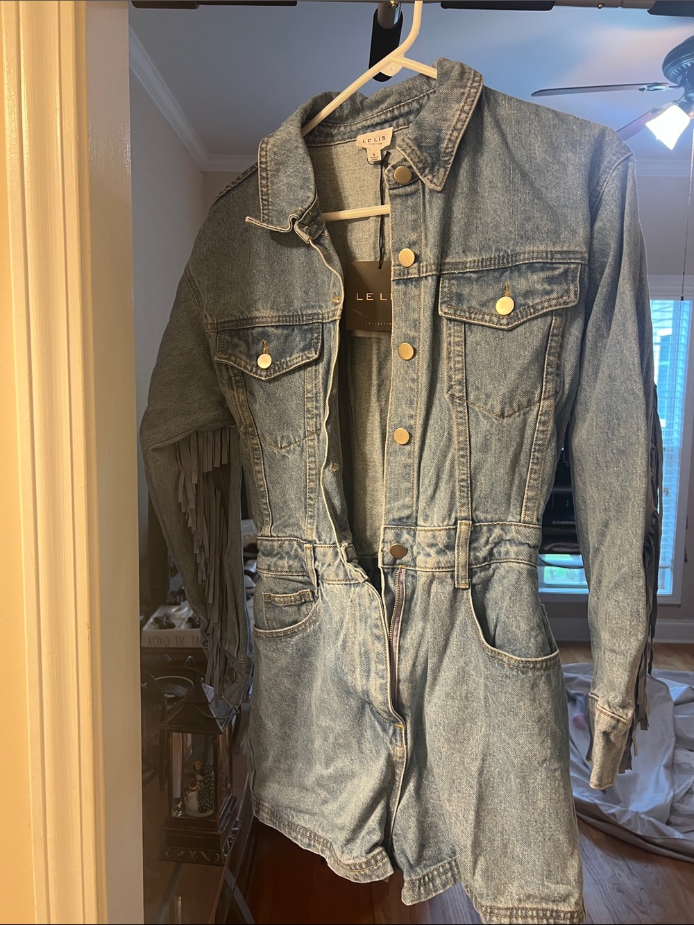Le Lis Light Blue Denim Jacket Romper with fringe detail.